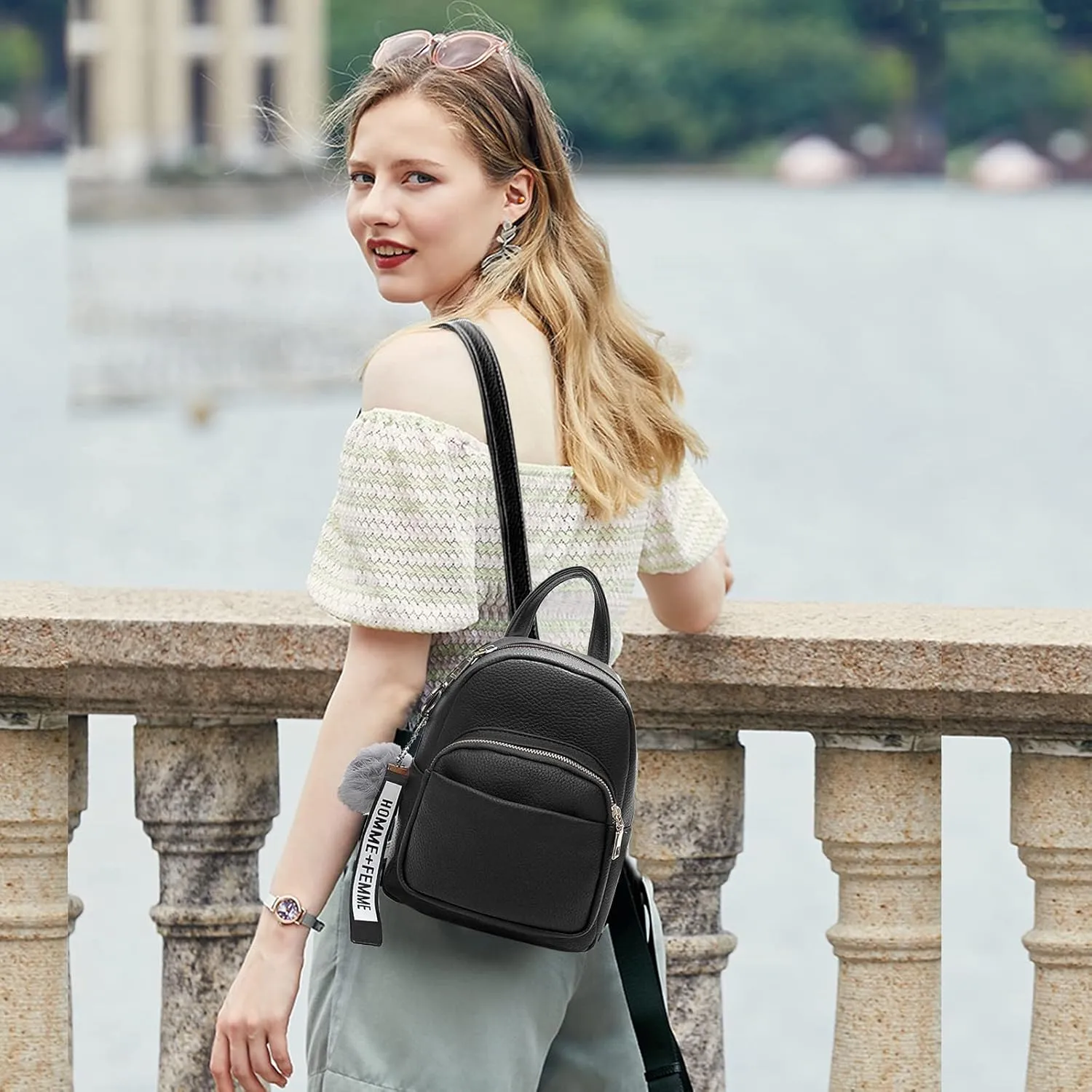 PORRASSO Fashion Mini Backpack Ladies Daypack Small Rucksack with Pompom Women PU Leather Backpack Purse for Travel Dating Shopping Black